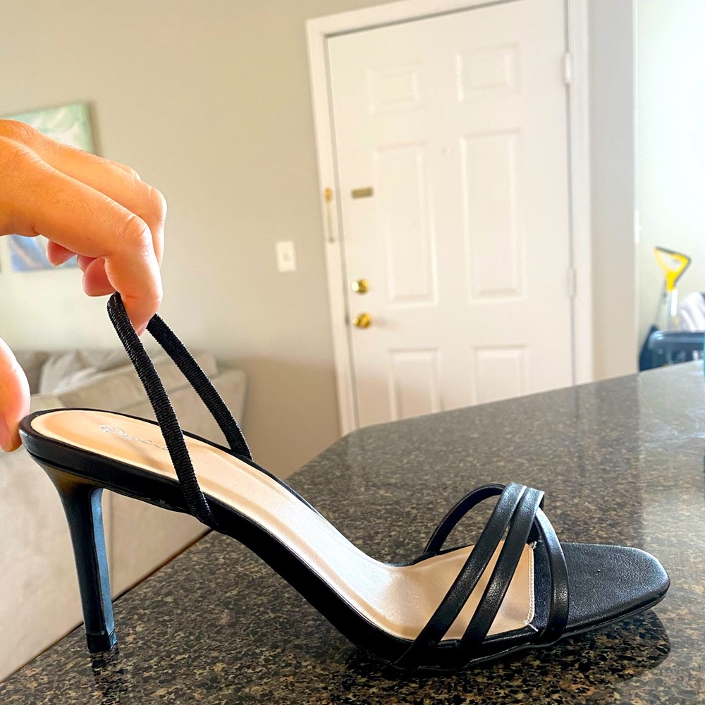 Cute 2 inch black heels. Perfect for any occasion
